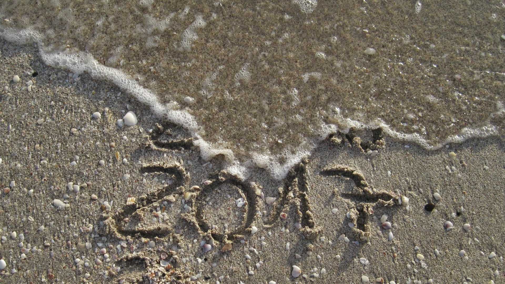 "2017" washing away in the sand