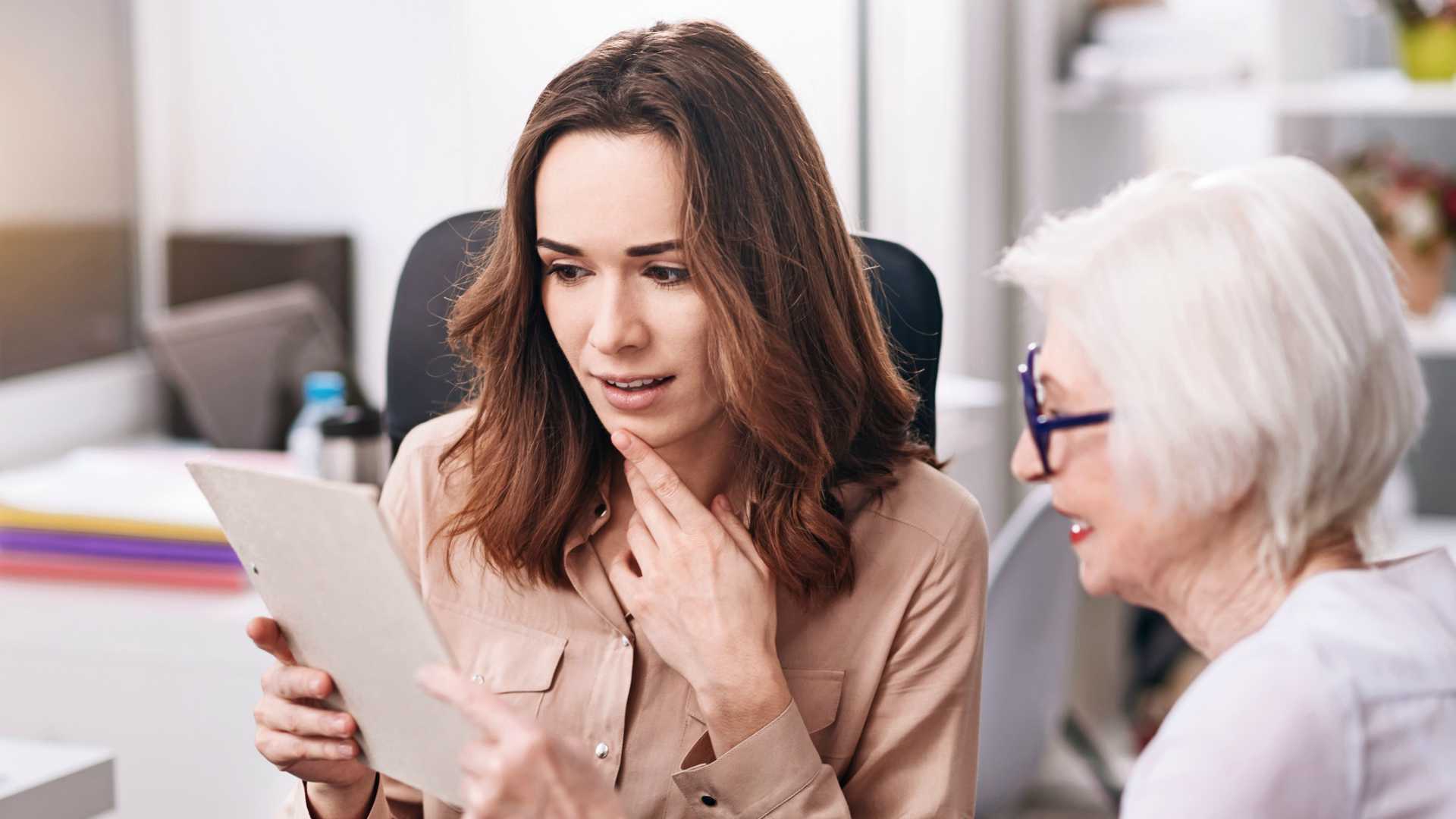 two female co-workers from two generations