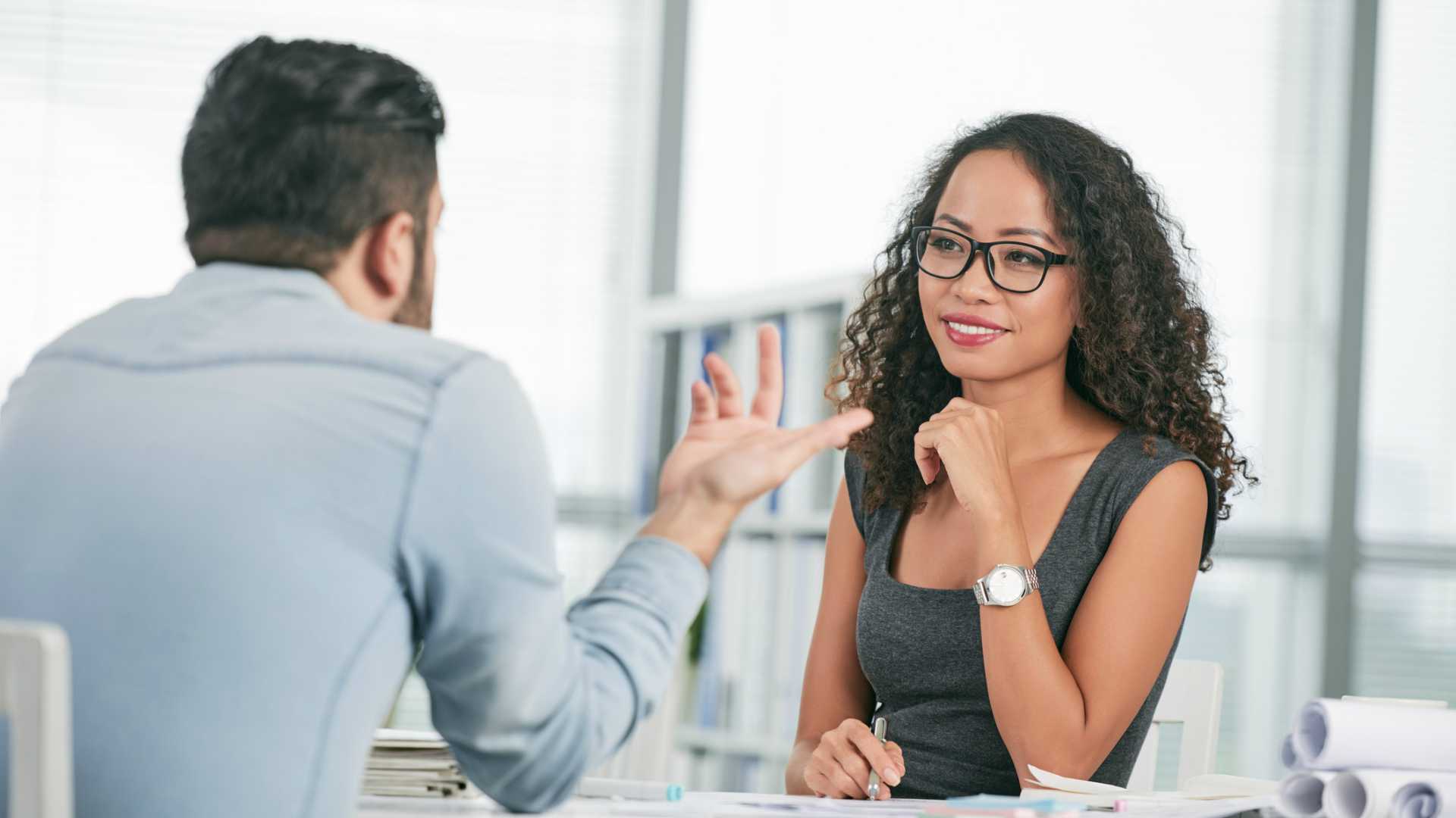 man and woman working together