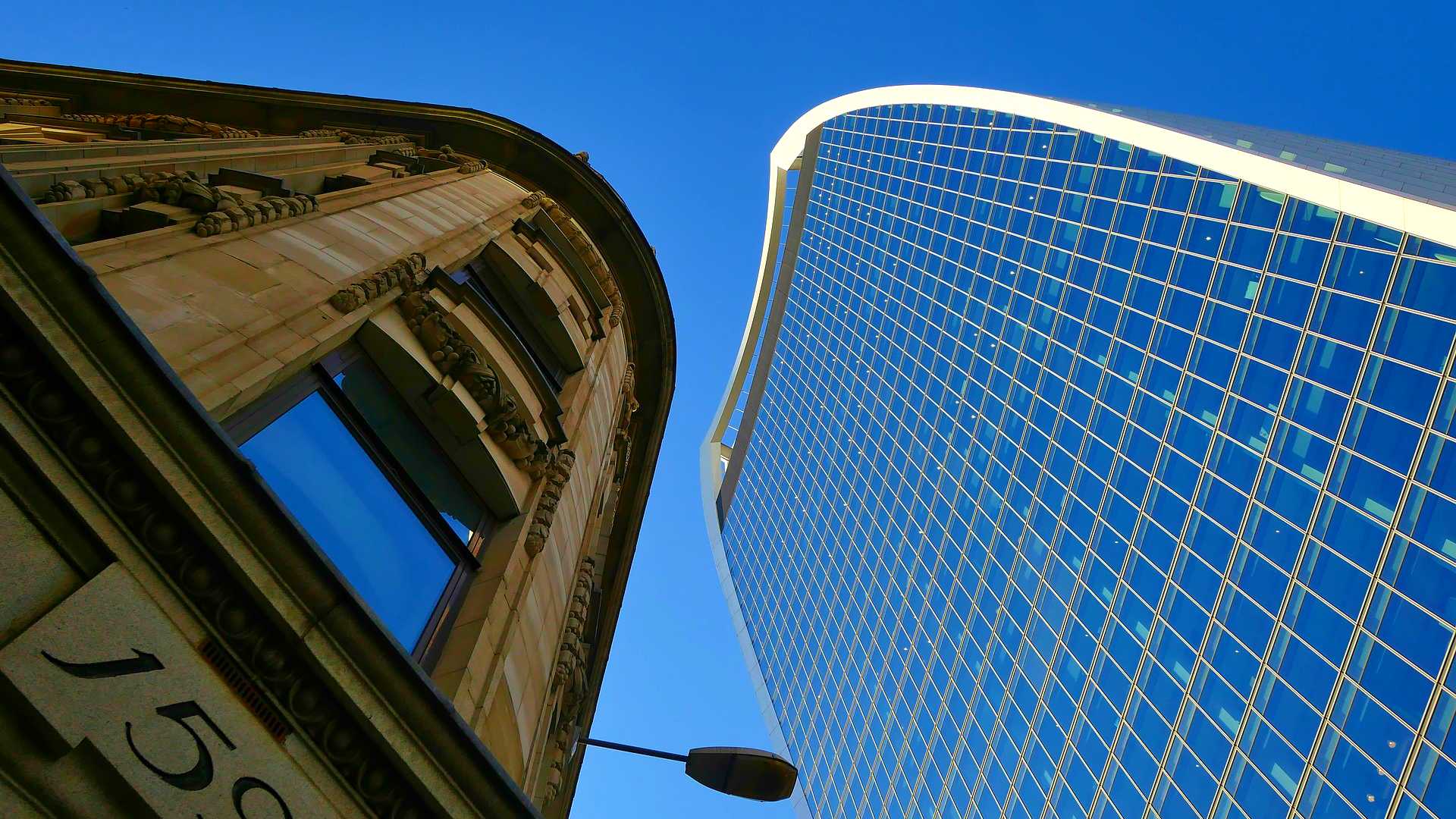 old building and modern building