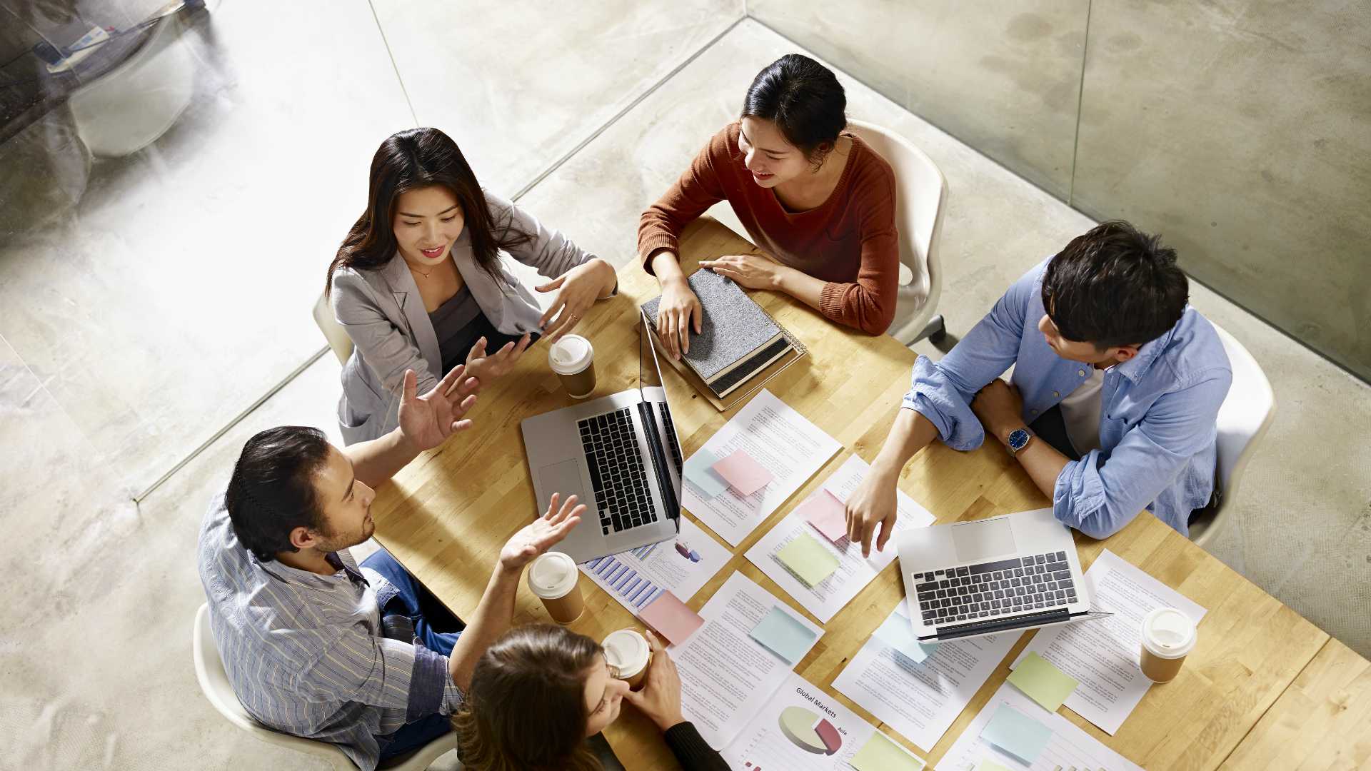 group of engaged employees working together