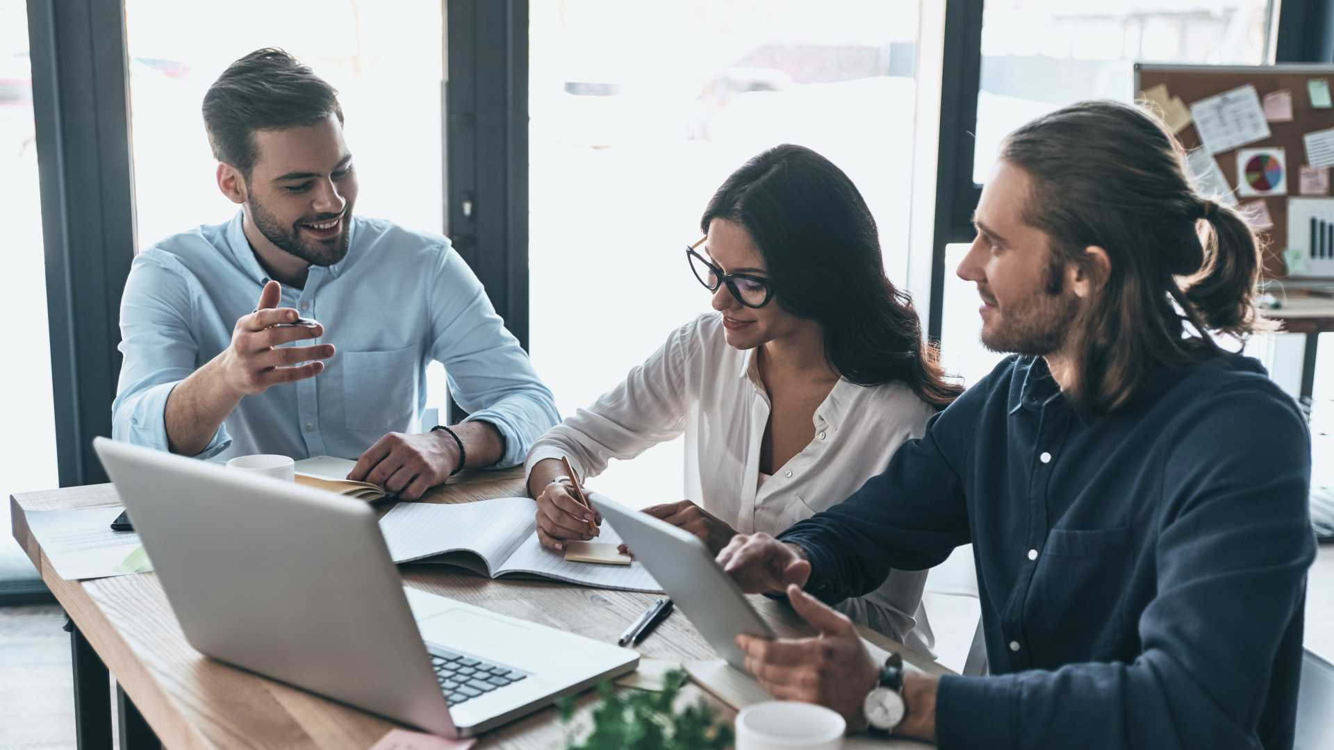 tech employees collaborating