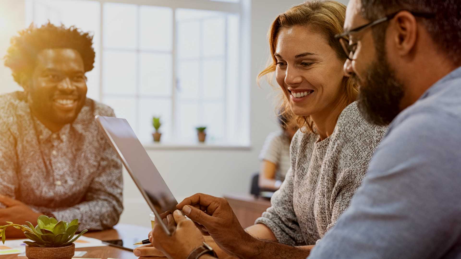 team working with a tablet