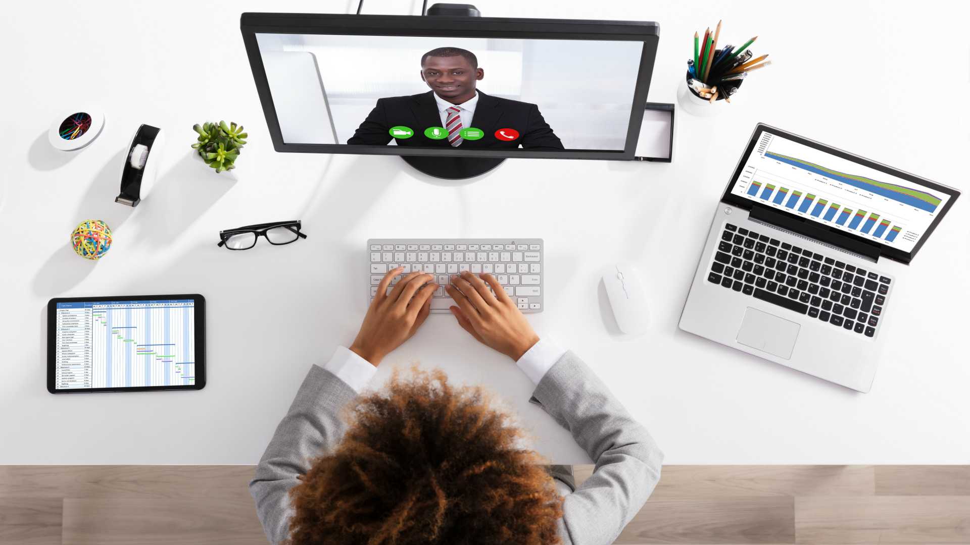 woman videoconferencing with her employee