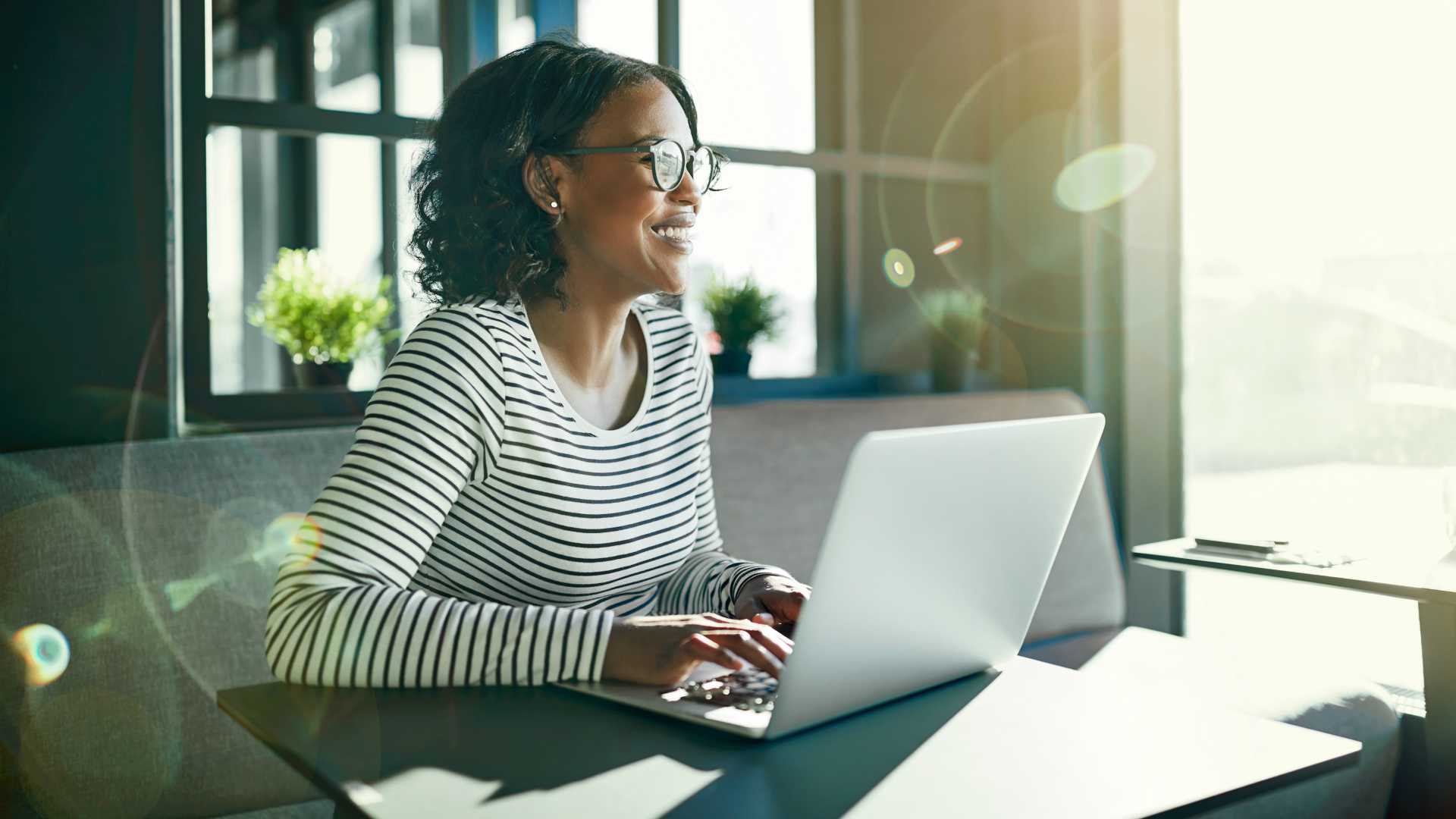happy woman using a laptop