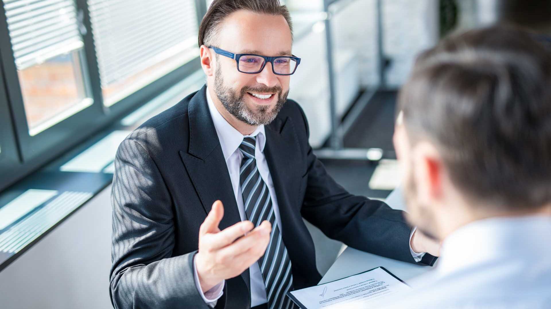 Businesspeople negotiating a contract