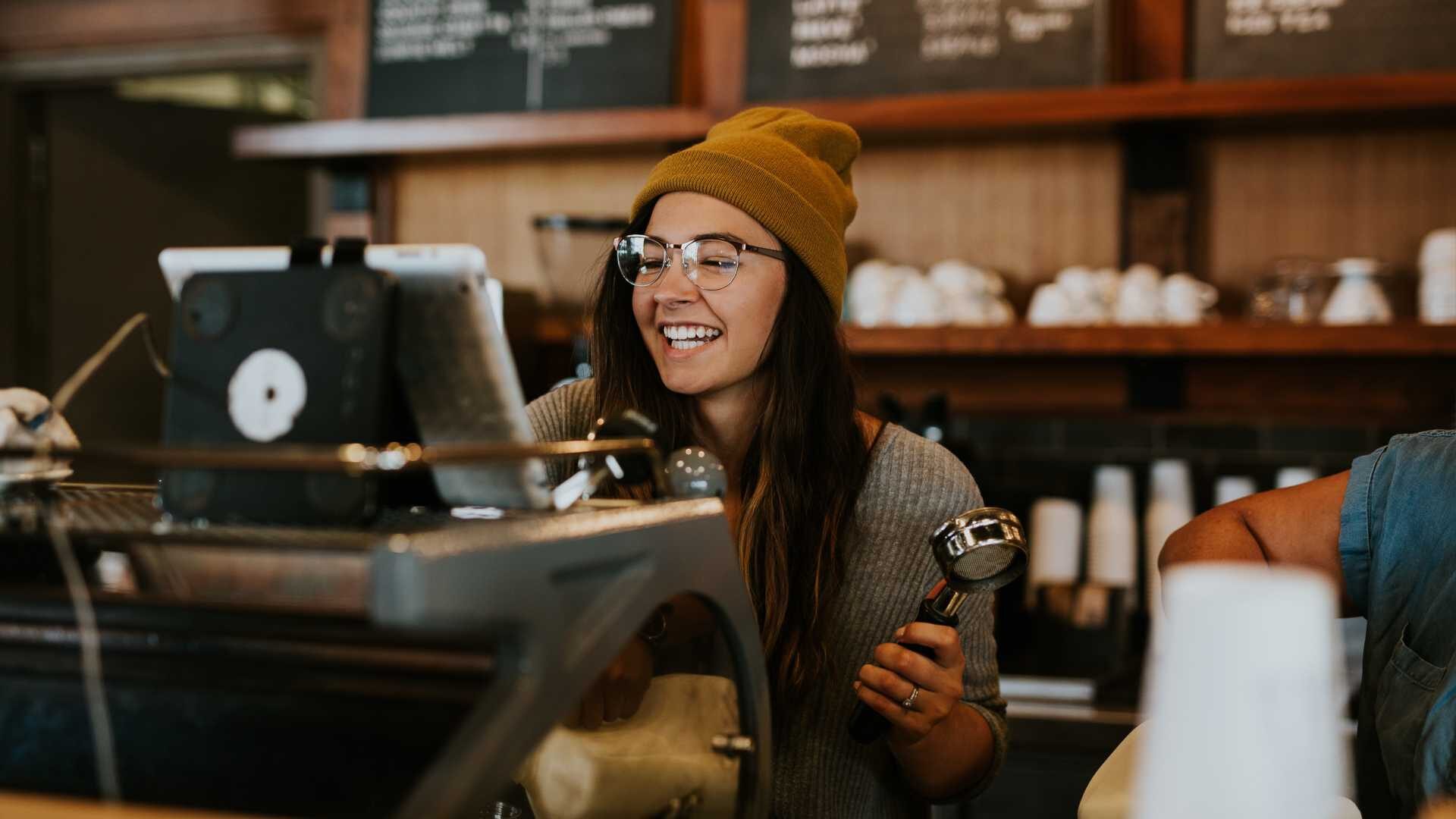 A barista working in a coffee shop