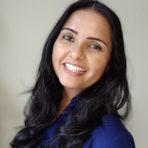 headshot of author sunanda pandit smiling at the camera