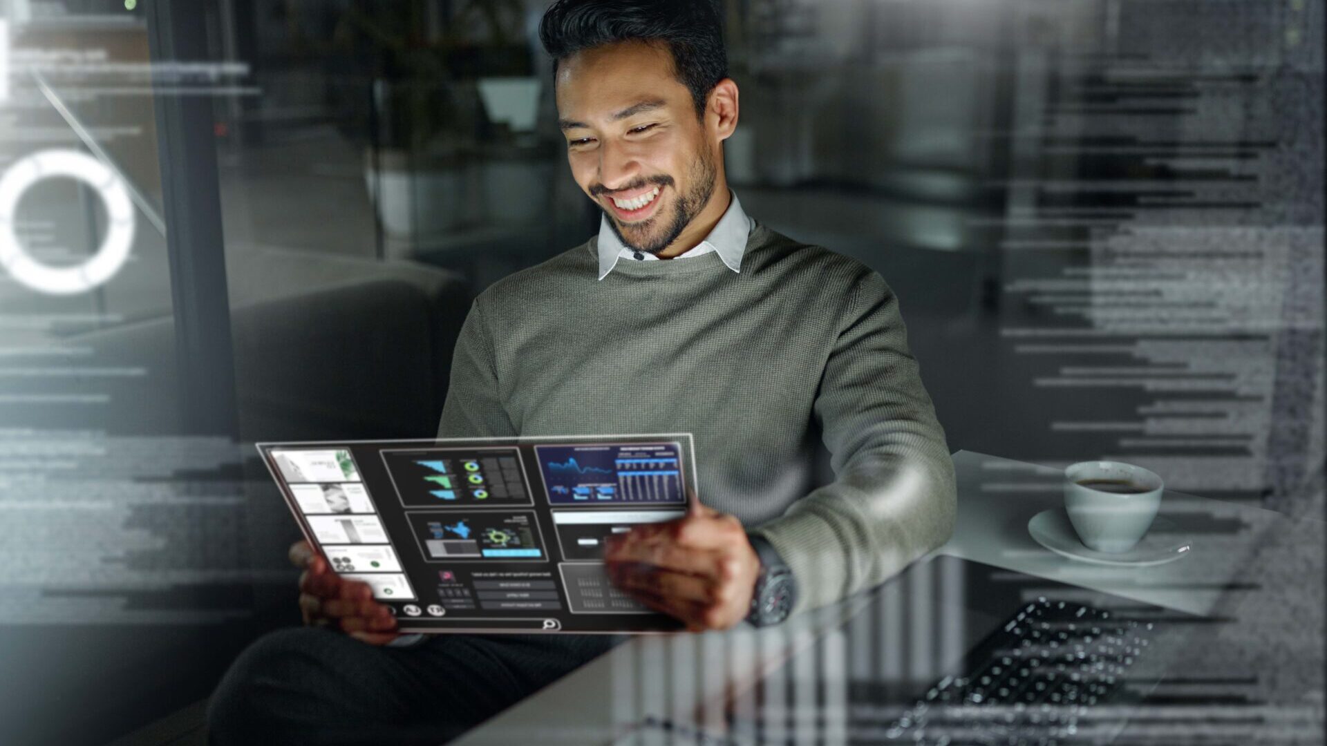 Man looking at a tablet with digital artwork him.