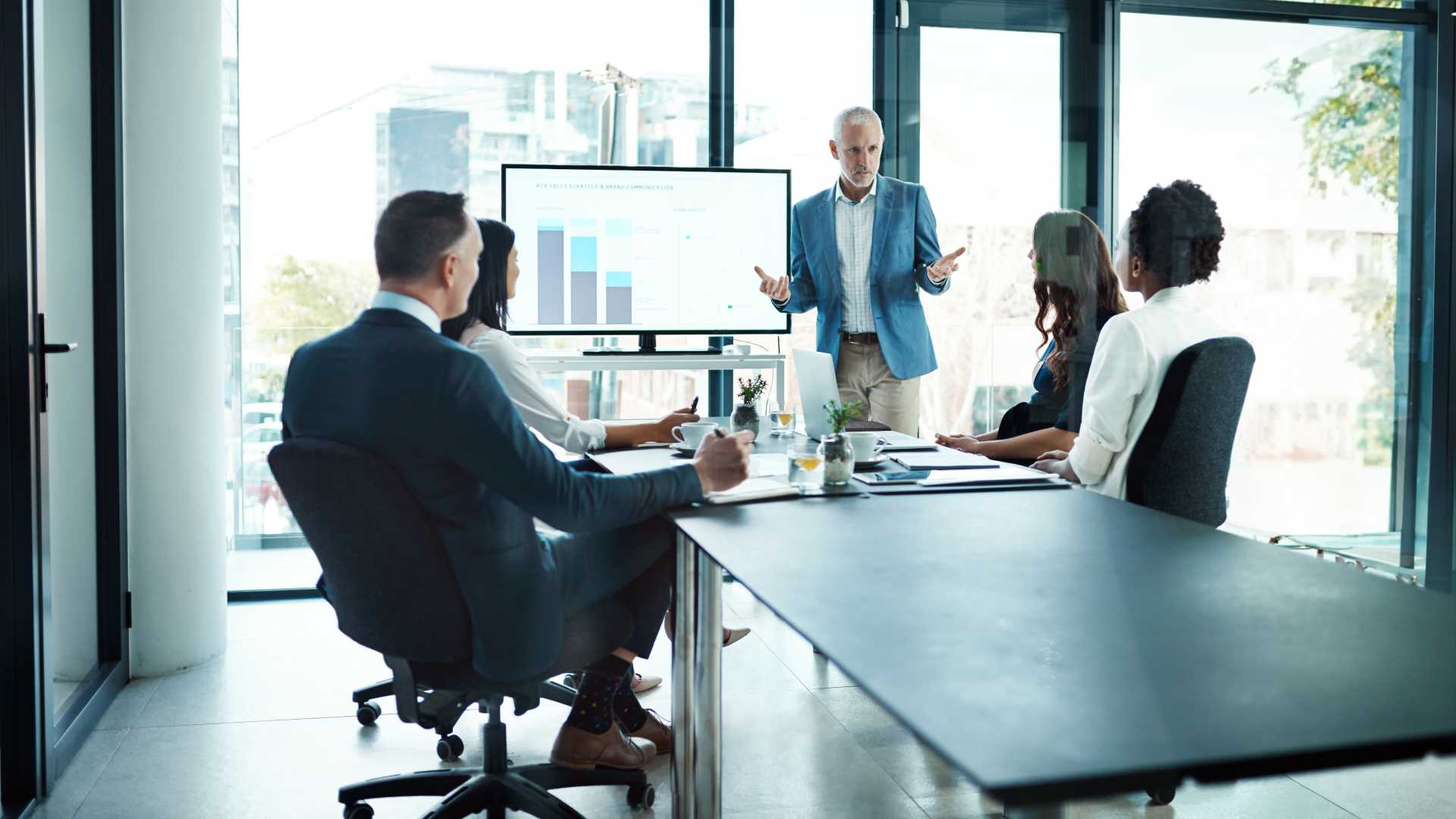 Team meeting looking at a powerpoint.